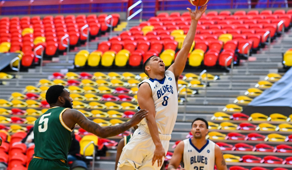 CJ Campbell completes a layup Saturday during a bronze semifinal defeat to St. Clair College.