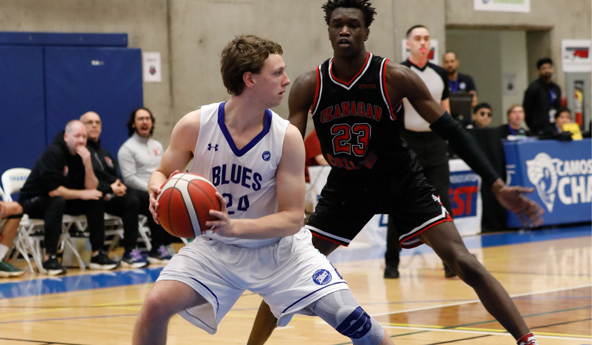 Josh Vandevelde secures a rebound in Thursday's quarter-final win over Okanagan College.