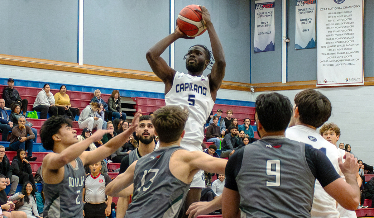 Capilano's Shakir Yakubu (5) was a big boost of the bench Friday in a season-opening win over Douglas College and the Blues reserves had a big hand in the pair of wins on the weekend. (Leire Coloma photo)