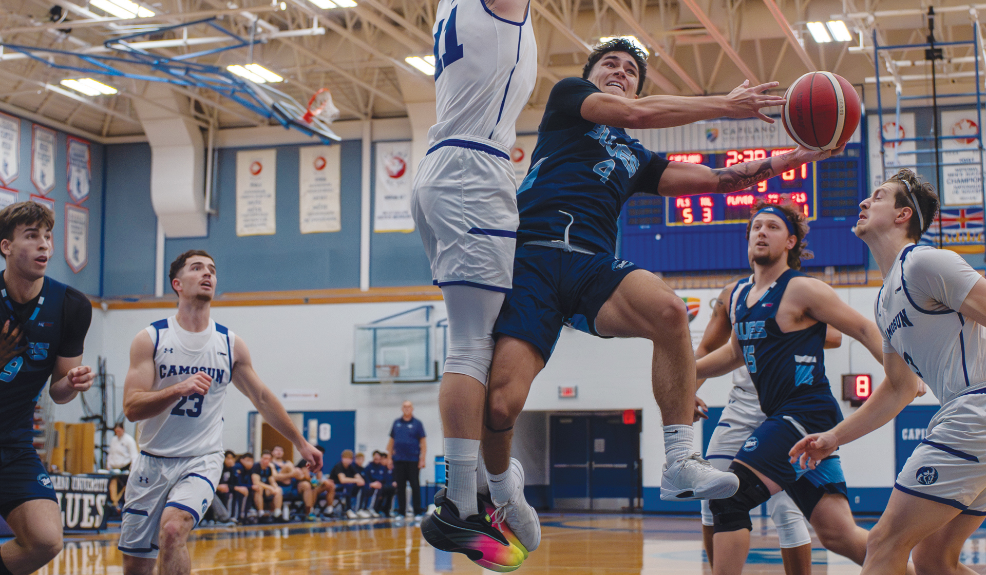Afu Bullock (4) and the Capilano Blues used a big third quarter Nov. 22 to earn a split on the road at Okanagan College. (Chris Raeside photo)