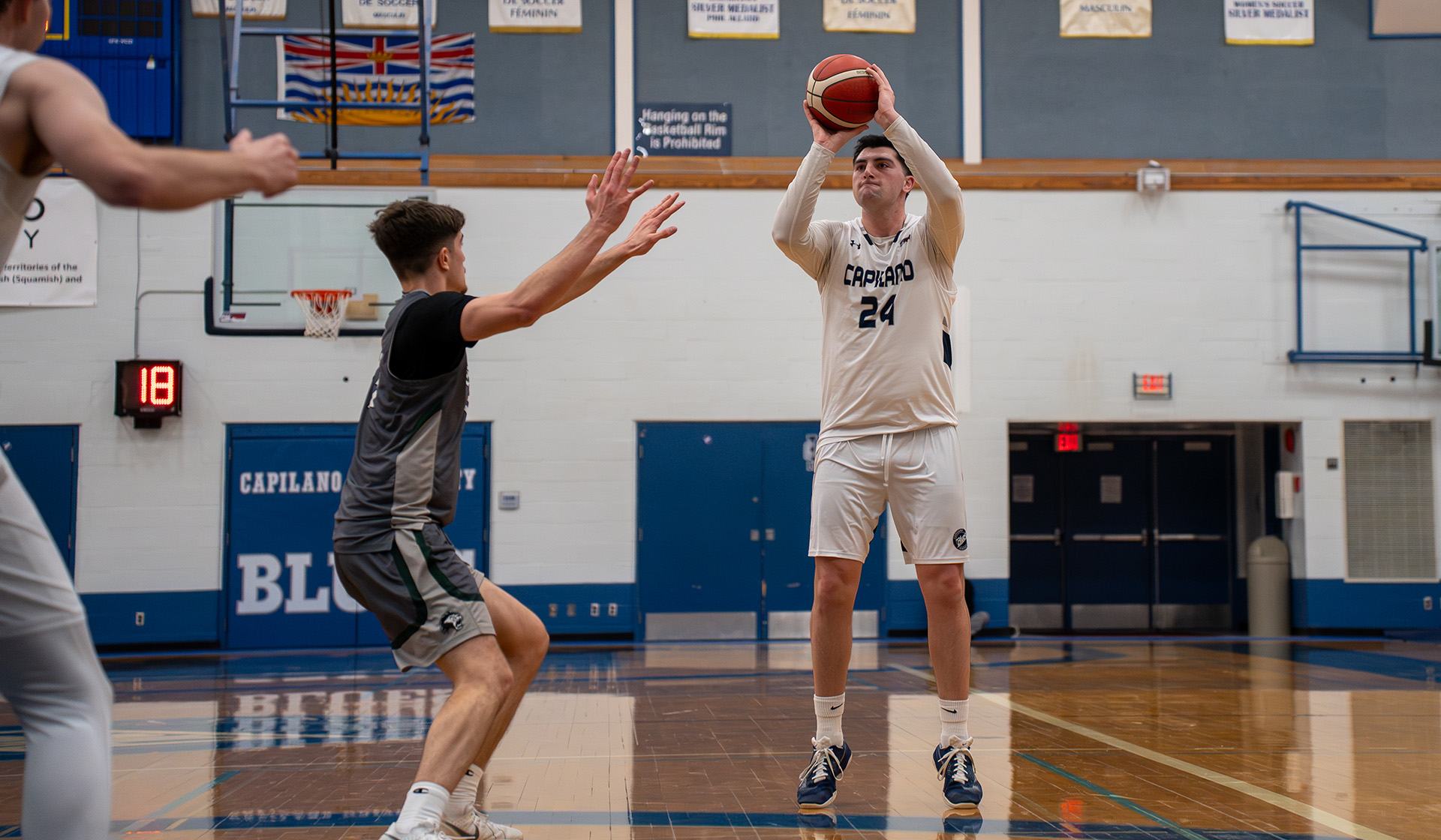 Zach Hamed fires from downtown as part of an 85-78 win Feb. 6 over the Douglas College Royals. (Chris Raeside photo)