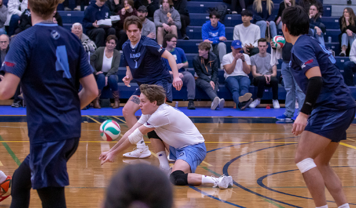 Cole Appleton digs a VIU attack during a weekend road trip to Nanaimo. (Matt Carter/VIU Athletics)