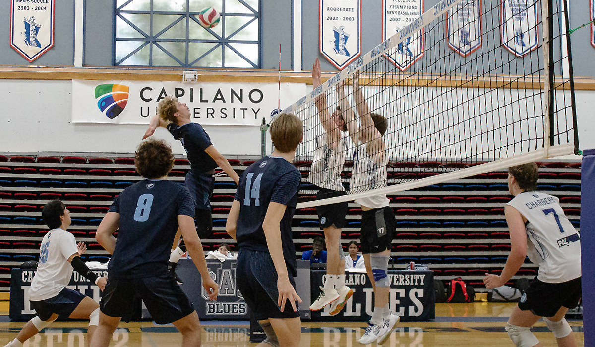 Marco Kost loads up for a big swing Saturday in an eventual 3-1 loss to Camosun College at CapU's Centre for Sport and Wellness.