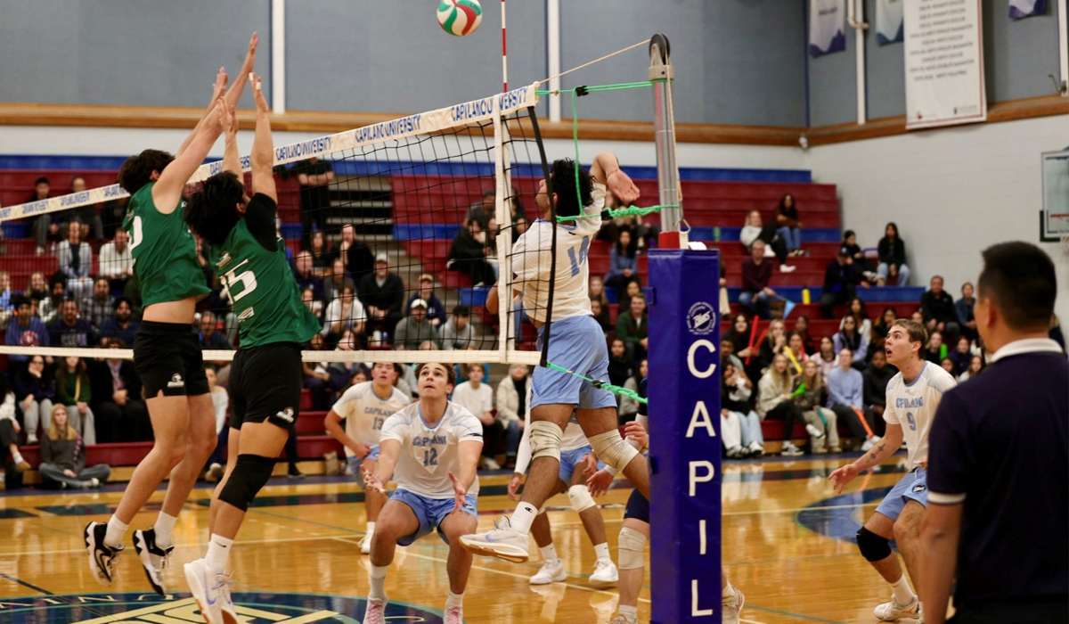 Capilano's Yash Sohi gets vertical as he lines up a swing against Douglas College in Saturday's five-set setback to the Royals. (Vancouver Sports Pictures)