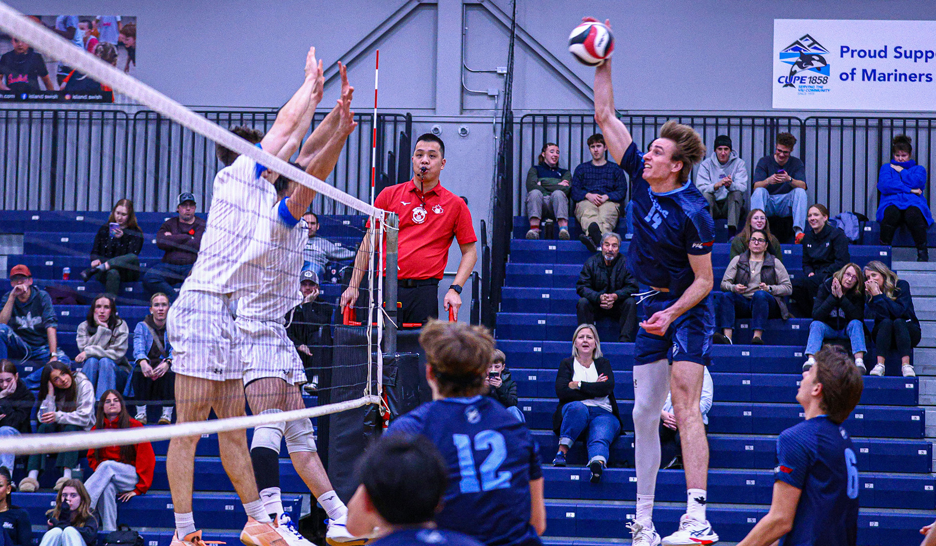 Luke Tiegen attacks from the right side (Photo: Matt Carter, VIU)