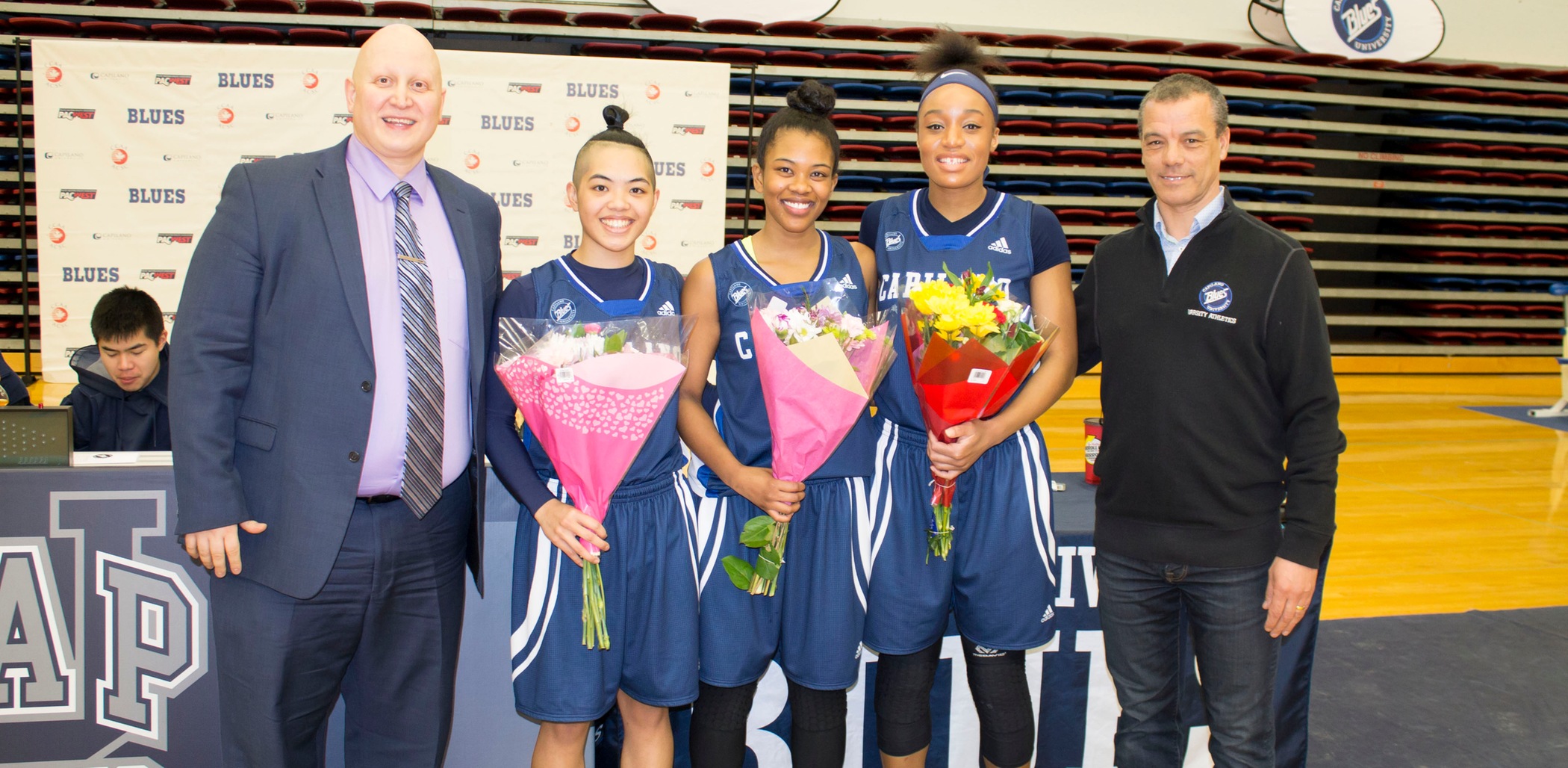 (L-R): Head Coach Ramin Sadaghiani, Ashley dela Cruz Yip, Francis Penafiel, Carmelle M'Bikata, Athletic Director Milt Williams. Photo Chris Raeside / Capilano University