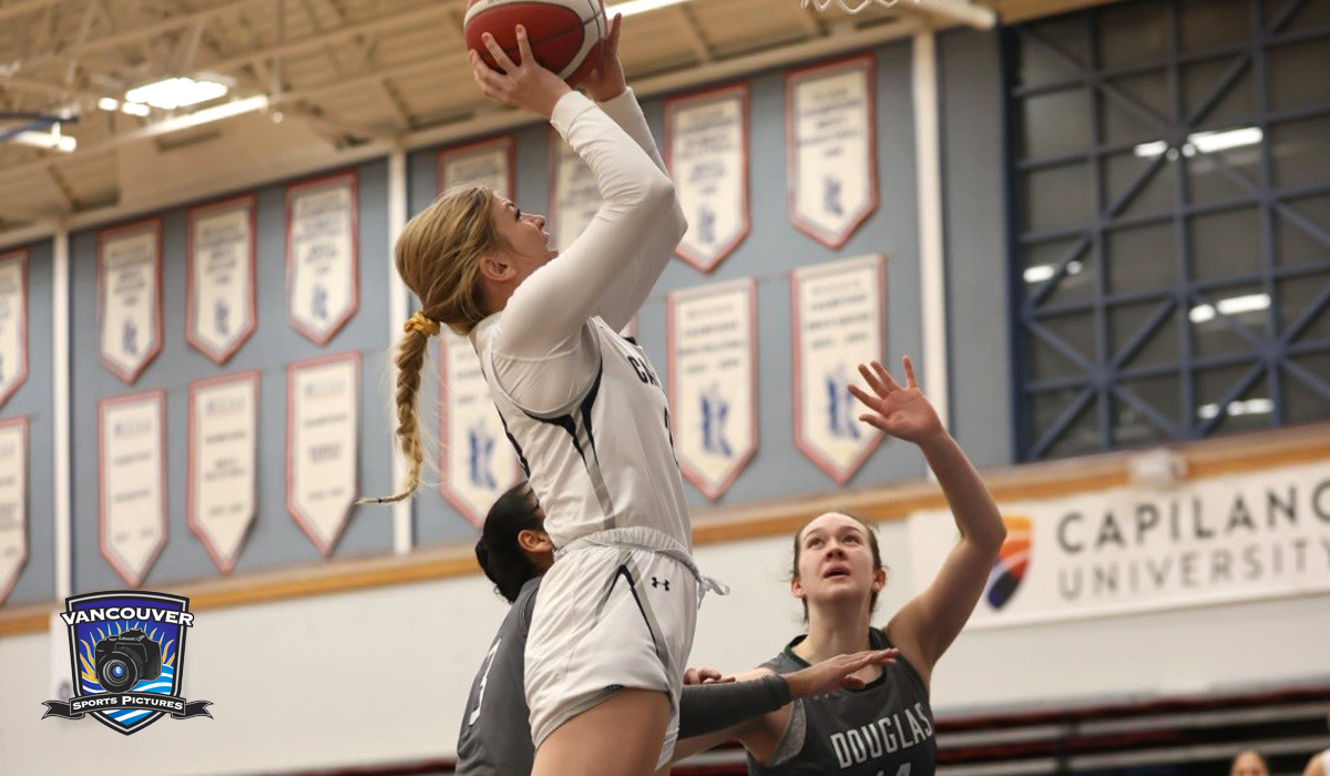 Meagan Briggs puts back two of her game-high 22 points Friday night against Douglas College.