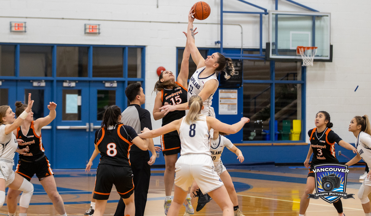 Mackenzie Smith wins the tip against Langara. Smith and the Capilano Blues host Vancouver Island University Feb. 3 and 4 with top spot in the PACWEST on the line.