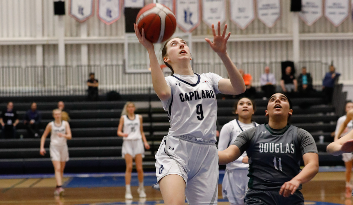 Alanya Davignon swoops to the hoop for two points during Capilano's 60-49 semifinal win over Douglas College Friday at the PACWEST provincials. (Athena Pimental photo)