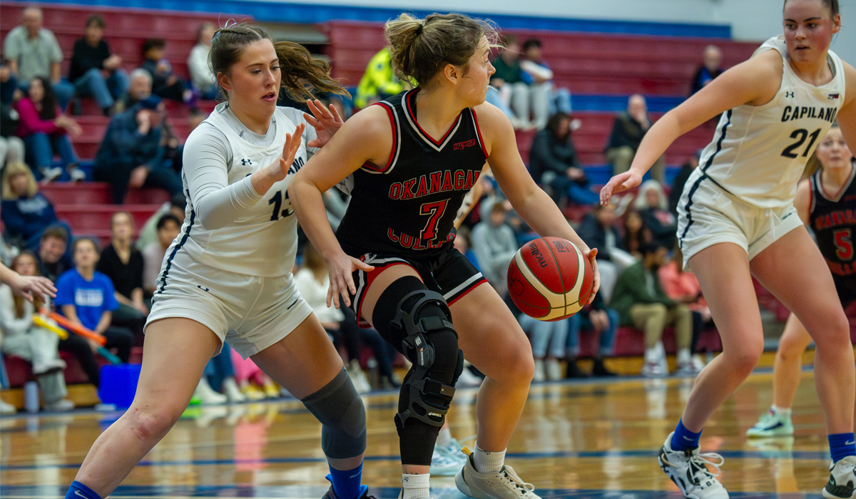 Capilano's Alexa Kusel defends Ali Martineau of Okanagan College as part of a 71-42 Blues win Friday, Feb. 9. (Photo courtesy of Isabella Patino)