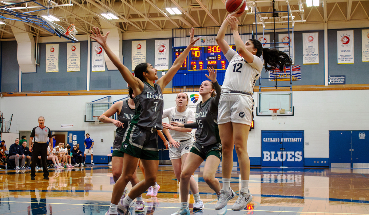 Capilano's Sereena Hothi (12) pulls up for a jumper during Friday's PACWEST season opener, an eventual 71-67 win for Douglas College. (Leire Coloma photo)
