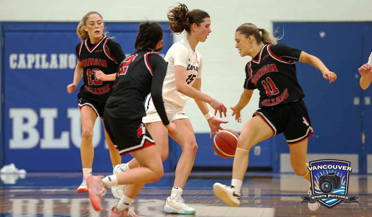 Mia Parkin (with ball) and the Capilano Blues sustained a pair of losses to the CBC Bearcats Nov. 15 and 16. (Vancouver Sports Pictures)