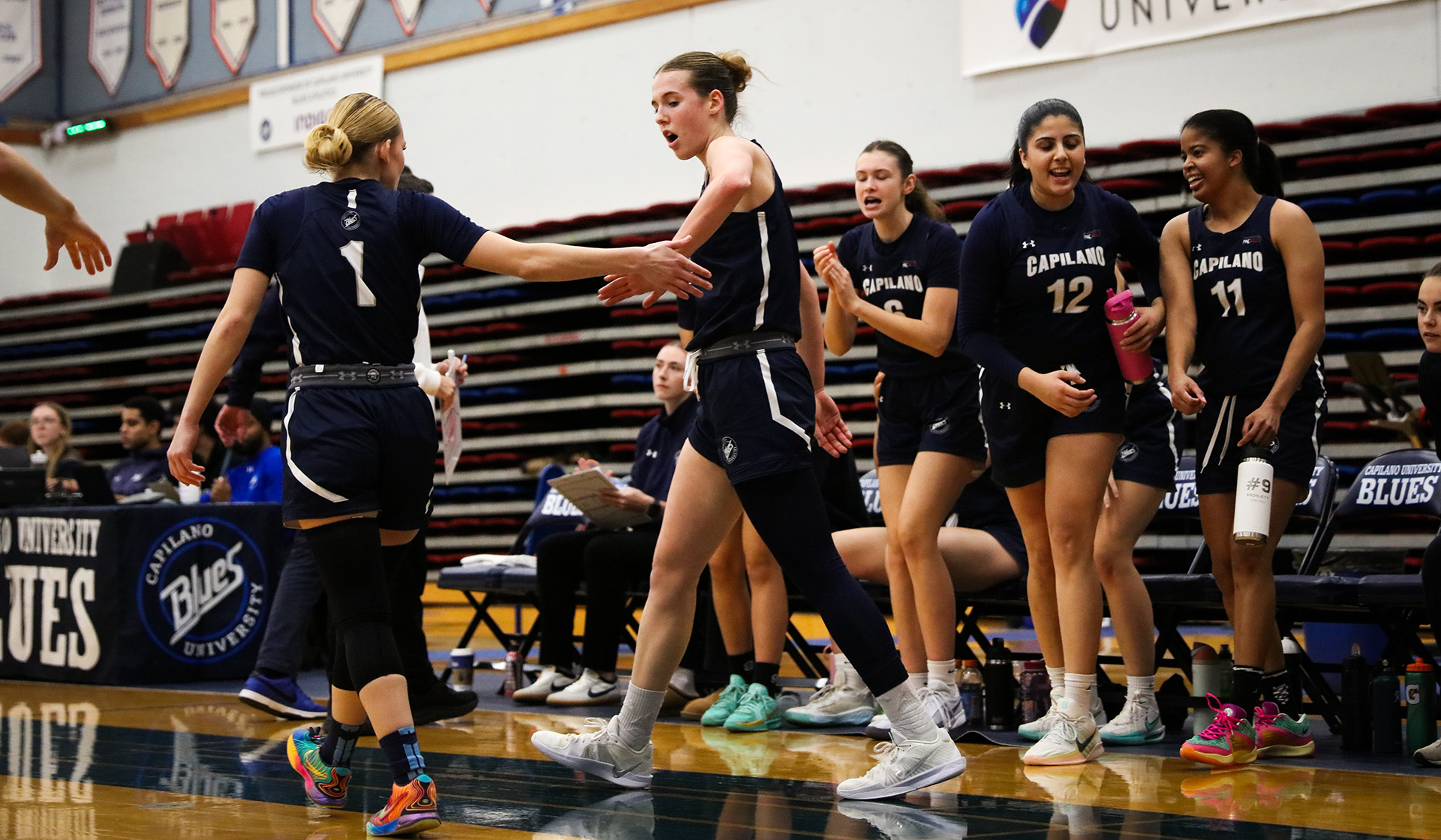 Lauren Tomlinson and Barcha Hnizdilova celebrate a moment (Braeden Yu photo)