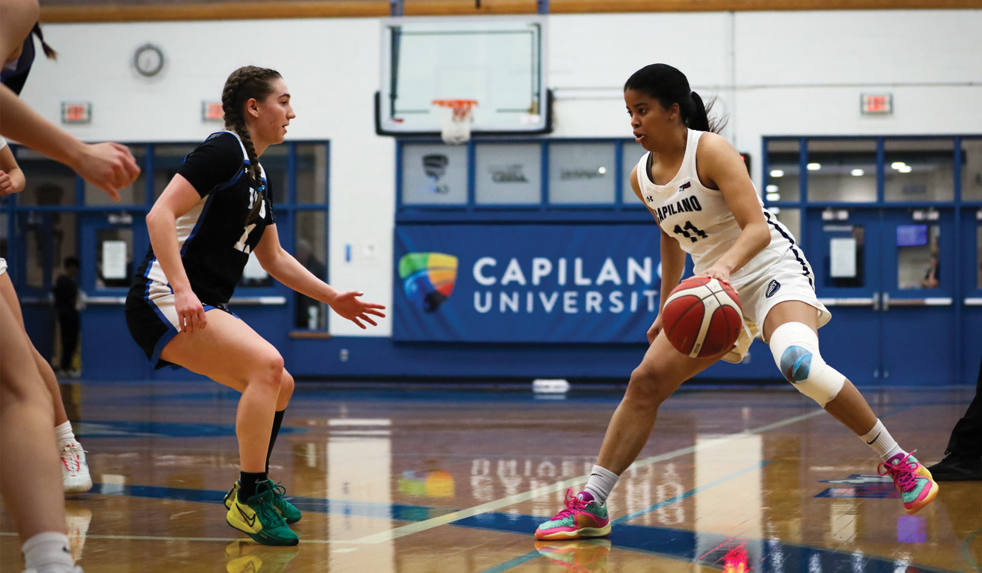 Sheleese Hoilett handles the ball on the perimeter during Friday's 57-45 setback to visiting Vancouver Island University. (Braeden Yu photo)