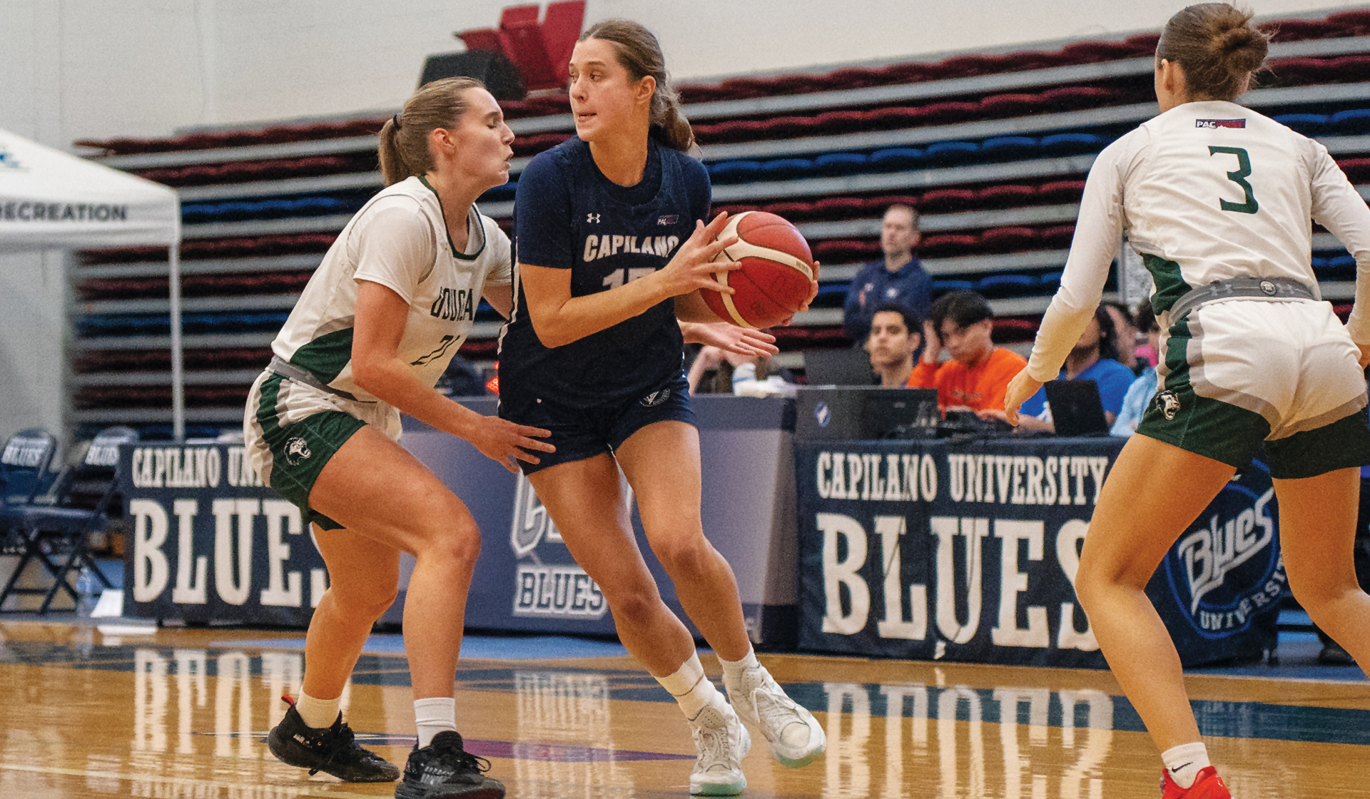 Mia Parkin (with ball) had 12 points each game as Capilano split a road weekend at Douglas College. 