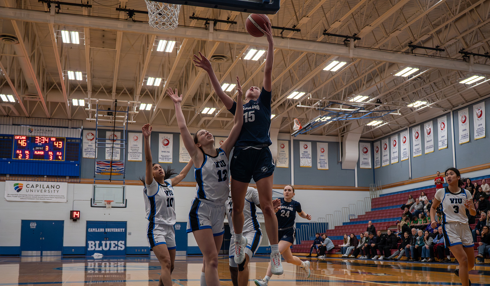 Mia Parkin with a layup vs. VIU (Photo: Chris Raeside)
