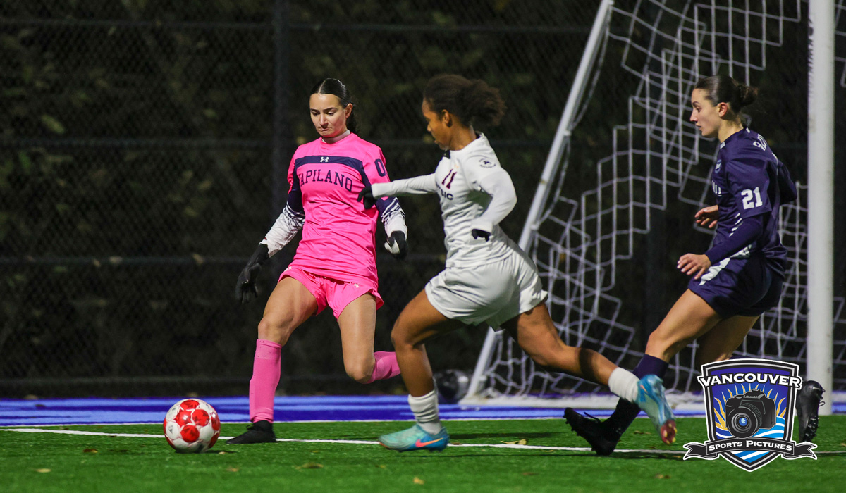 Blues keeper Amaya Salvino moves up to prevent a scoring chance by Ahuntsic's M&eacute;gane Gagnon as part of a 5-0 Blues setback Wednesday, Nov. 6 at CCAA Nationals.