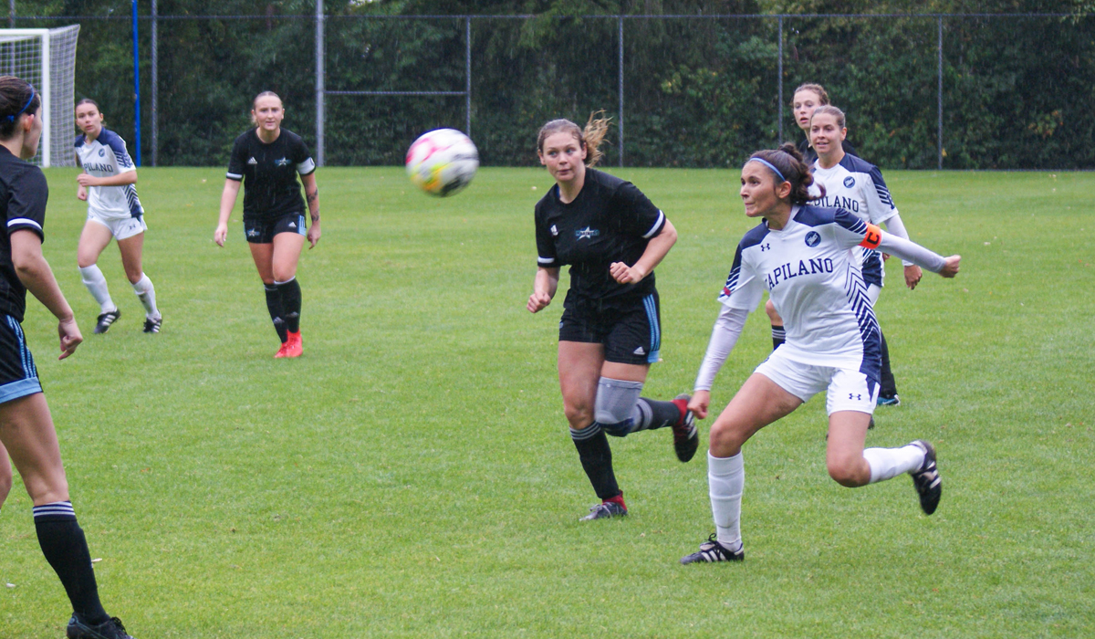 Alanah Dulong tracks down the ball against Vancouver Island University Saturday afternoon at Lillooet Park. Dulong scored twice in a wild, come-from-behind 4-4 draw.