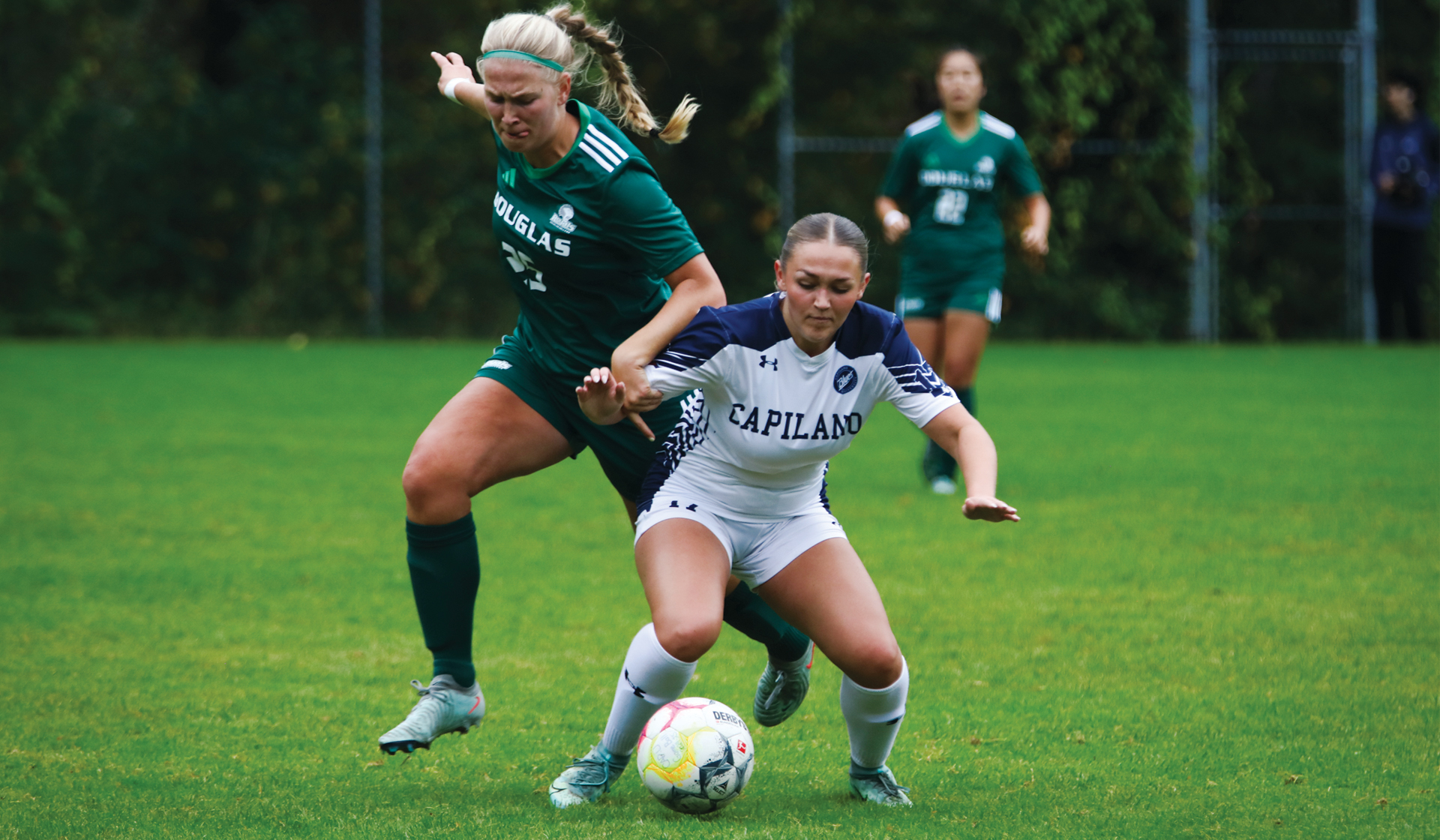Blues forward Kaitlyn Johnson works to maintain possession as part of a 2-1 defeat to Douglas College Saturday, Sept. 27. (Braeden Yu photo)