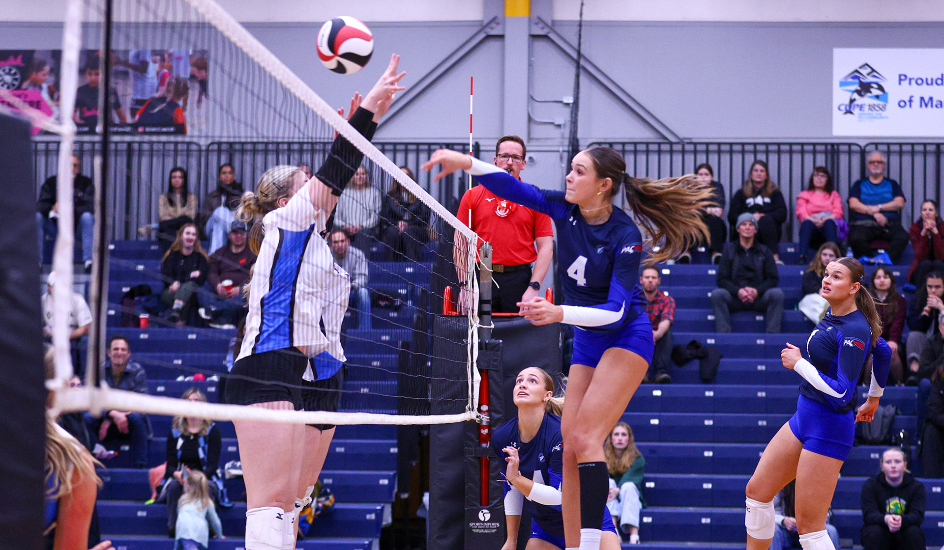 Natalie Rourke attacks out of the middle (Photo: Matt Carter, VIU)